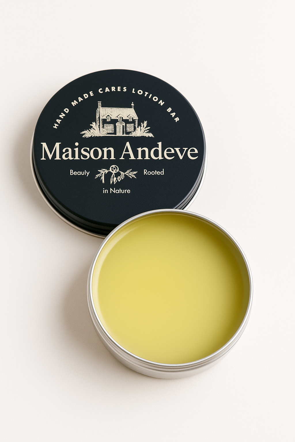 Handmade natural lotion bar in reusable tin with smooth balm texture by Maison Andeve
