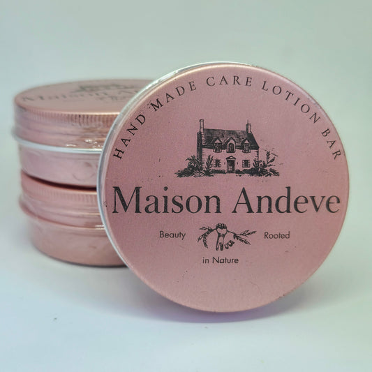 Stack of Maison Andeve Blushing Rose lotion bars in pink tins, natural solid skincare product for dry skin