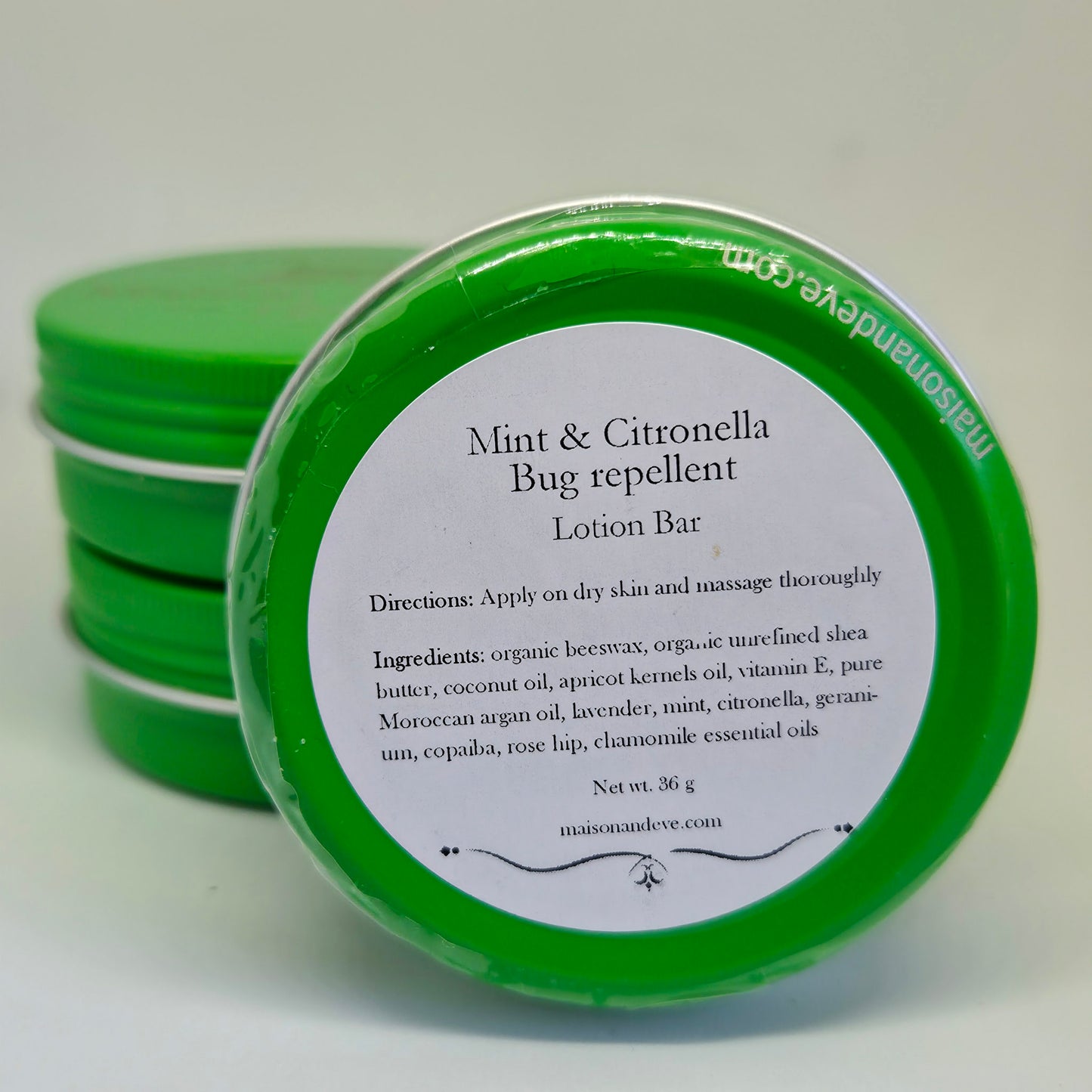 Back label of Maison Andeve mint and citronella lotion bar showing ingredients and directions for natural bug repellent balm