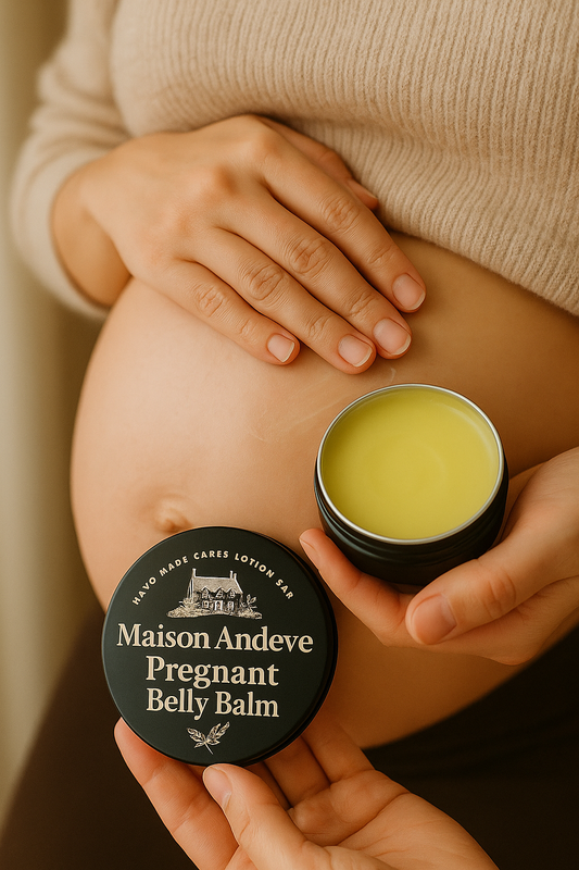 Pregnancy belly balm being gently applied to growing belly for skin comfort
